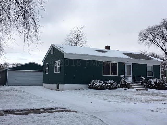 Front of house and large garage