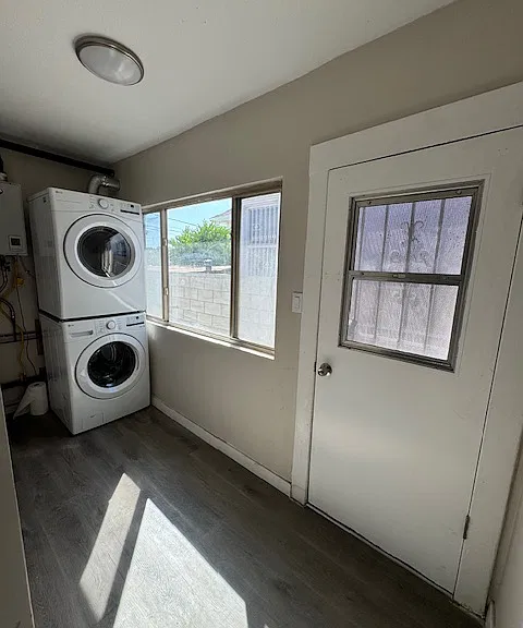 View from entrance of first door leads to the washer and dryer area