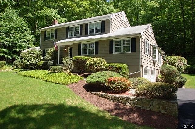 Nestled in a quiet clearing in picturesque Greenfield Hill minut