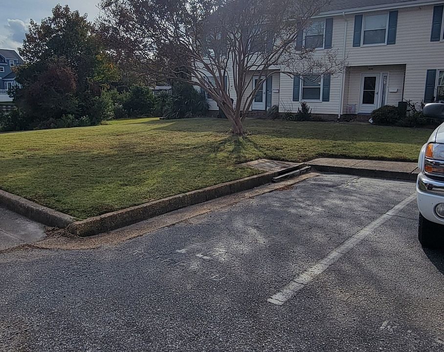 Two assigned parking spaces for each unit are included.