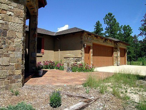 3-CAR HEATED GARAGE & SHOP