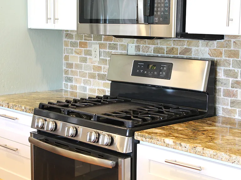 Gas range and microwave