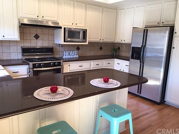Updated bright and light kitchen with stainless appliances.