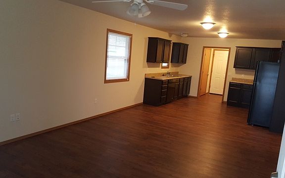 Livingroom, dining, and kitchen area as viewed from the front door