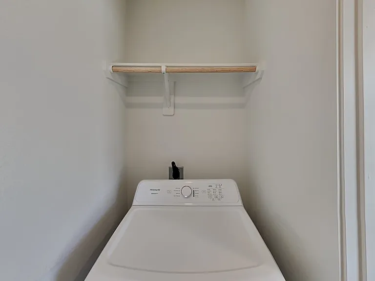 Minimalist white shelving unit