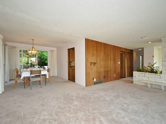 Open living and dining room is spacious and has lots of natural light