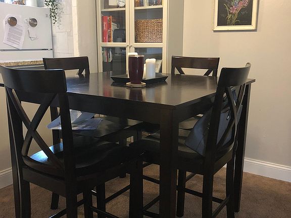 table and four chairs available for purchase