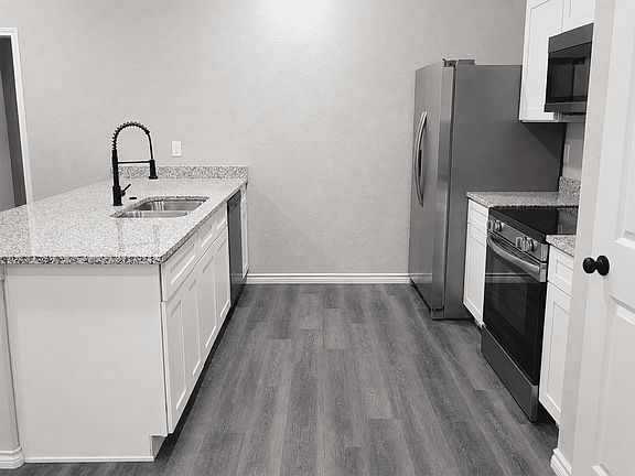 2nd image of 7602 Windsor Oaks #1