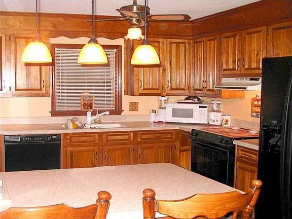 Updated kitchen with new appliances, Corian counters and shiny tile floor!