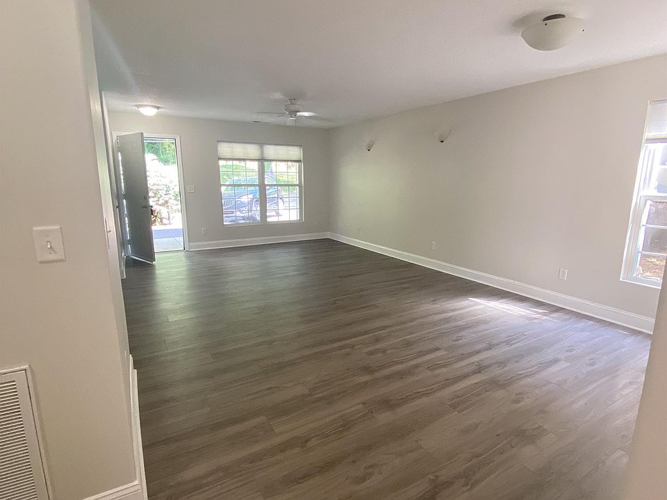 Living area viewed from the kitchen. No carpet throughout!