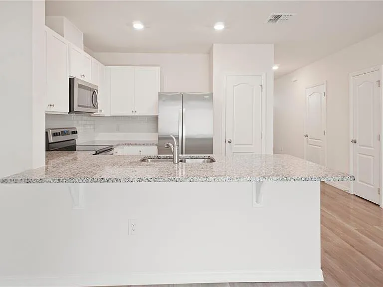 1311 Tallowwood Ln — Photo 9