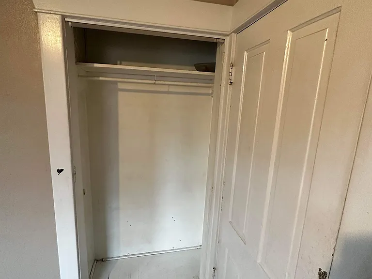 Good sized closet in the back bedroom.