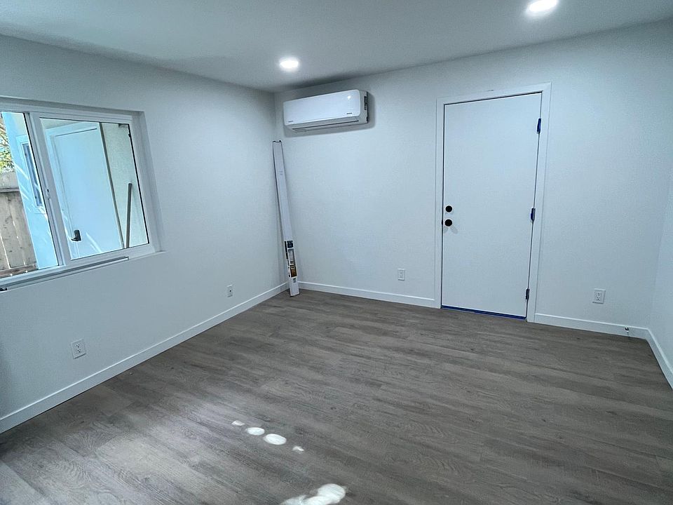Living room with door to the garage