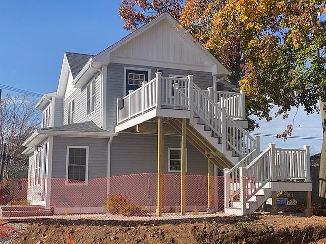 Entrance from rear, additional exit along the side of the house.