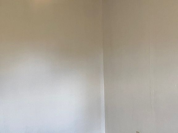 Living Room with Ceiling Fan with light