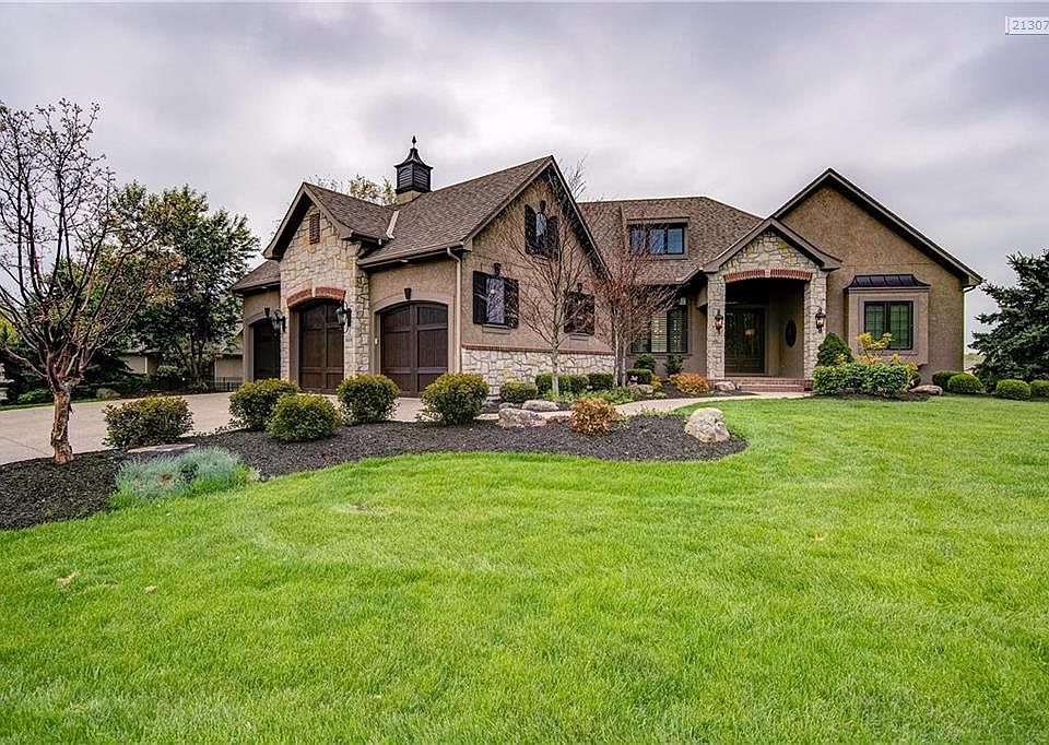 Welcome Home! Stunning home which sits on a cull-de-sac lot, next to protected greenspace to home's west. Plush landscaping and attention to detail from the moment you drive up.