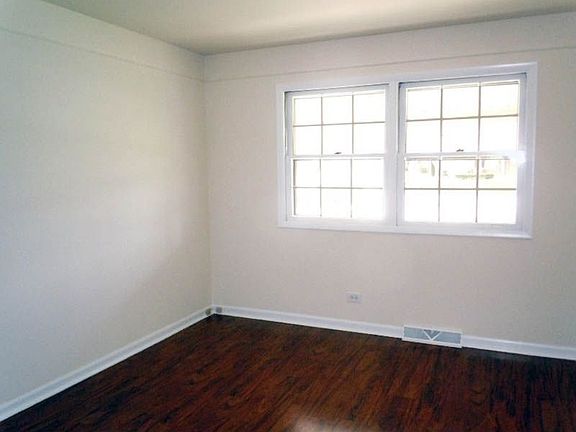 Dining Room with Hardwood Flooring
