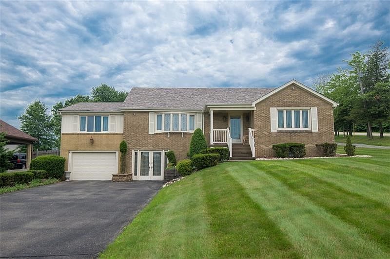 Welcome home to 14521 Blue Dell Lane a 3 bedroom brick ranch home in Norwin Schools.