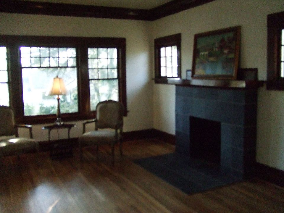 Living room featuring slate fireplace.