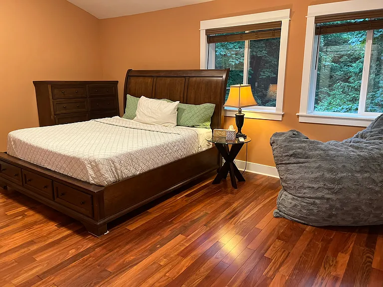 Master bed with vaulted ceilings