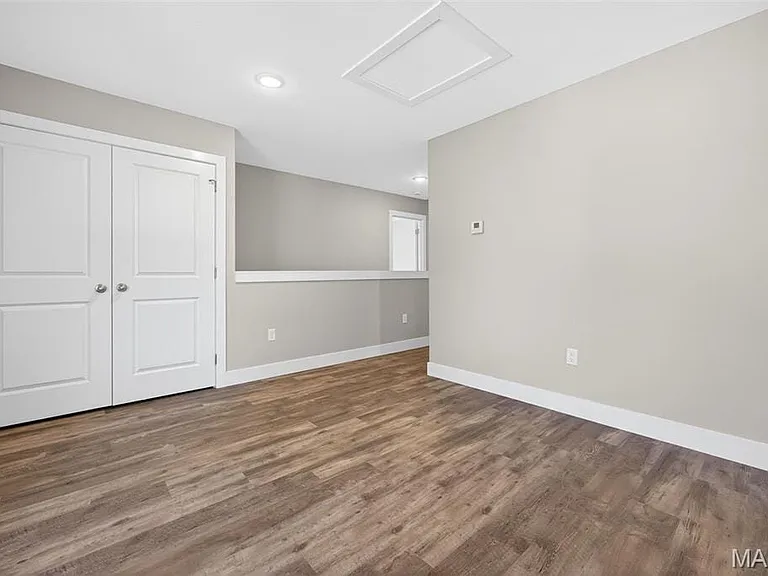 Laundry behind double doors upstairs