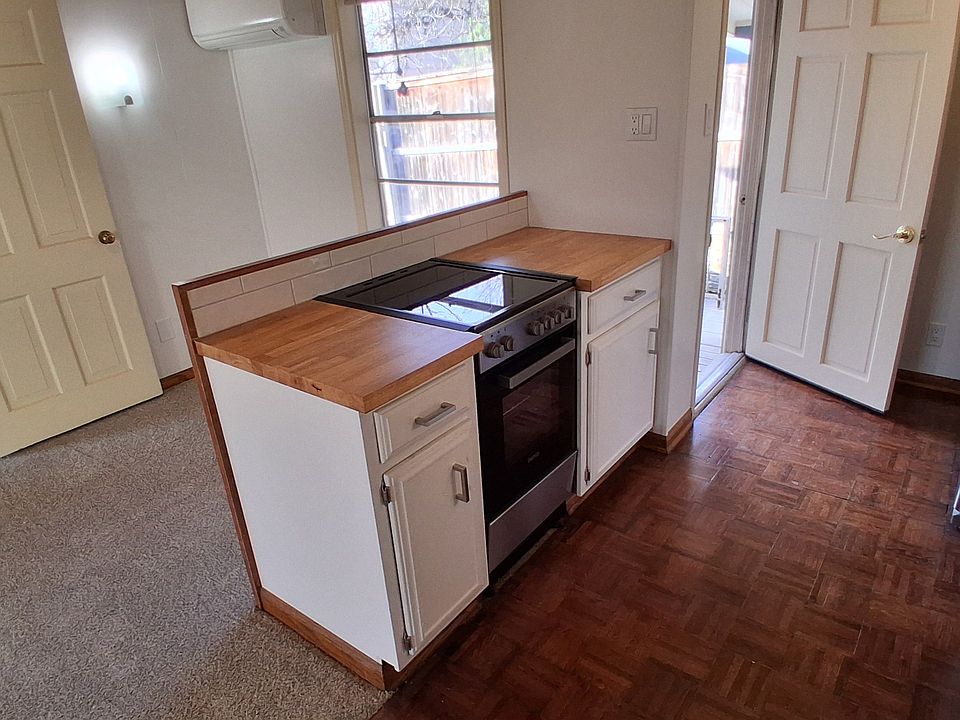 Renovated kitchen and back door to laundry