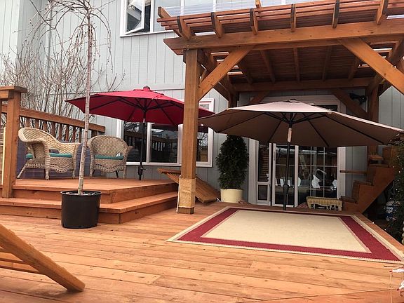 Incredible back deck with gate for privacy.