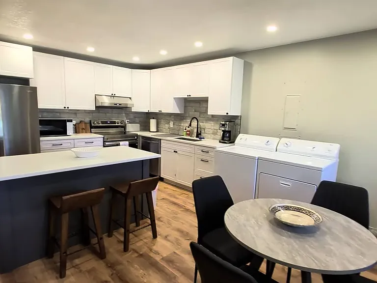 Kitchen with in unit Washer and Dryer