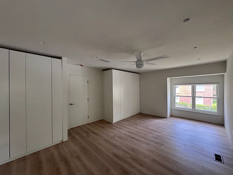 Bedroom 2 - Another primary bedroom with natural light, ceiling fan, and excellent built-in closet storage.