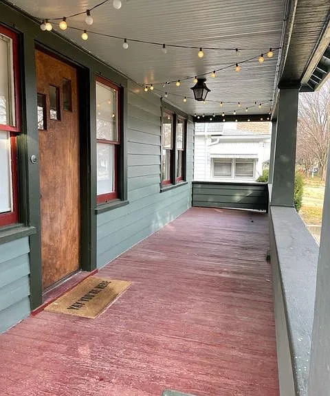 Fun party lights on front porch! Great spot to crack open a couple of drinks with friends!