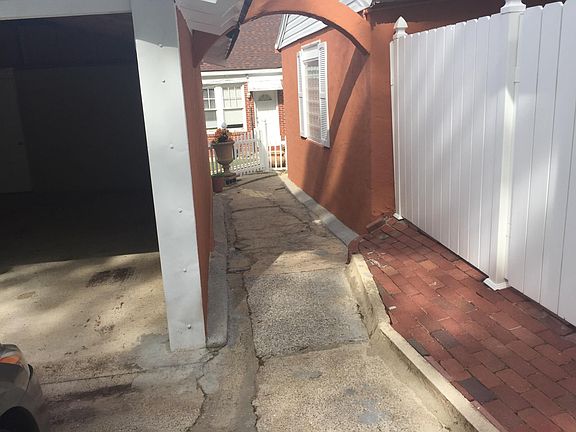 Well-lighted walkway to back door