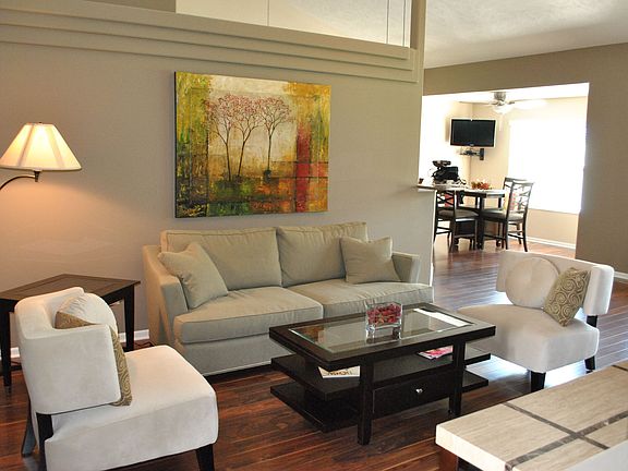 Living room and dining room with hardwood floors