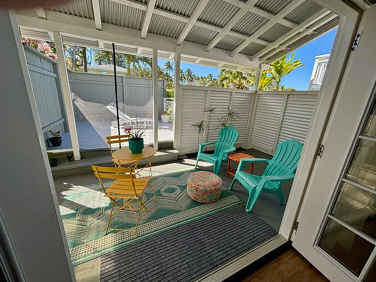 Outdoor living space. Covered screened in Lani. Private entry and deck for ocean breeze and view