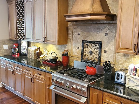 Beautiful updated kitchen with gas range vented to outside