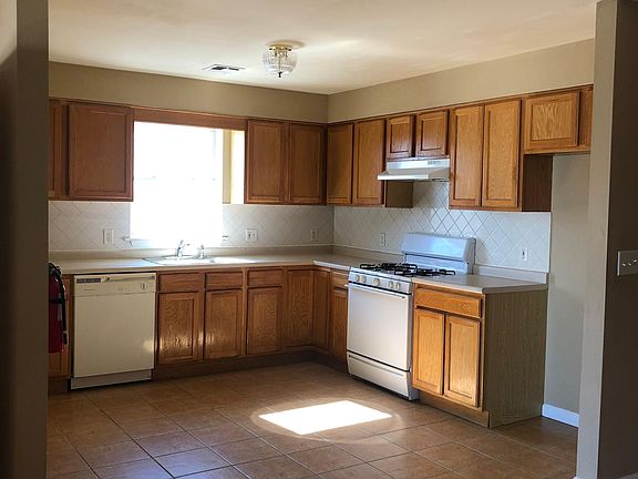 Kitchen includes dishwasher and stove