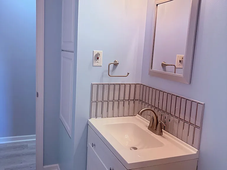 Newly Renovated Full Bath, new tub, toilet, vanity, flooring, sink, mirror and lighting, fresh paint