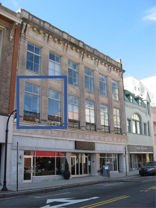 Exterior of Baldwin Lofts Building, Pointing Out Location of