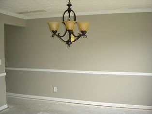 DINING ROOM W/BEAUTIFUL CHAIR RAIL