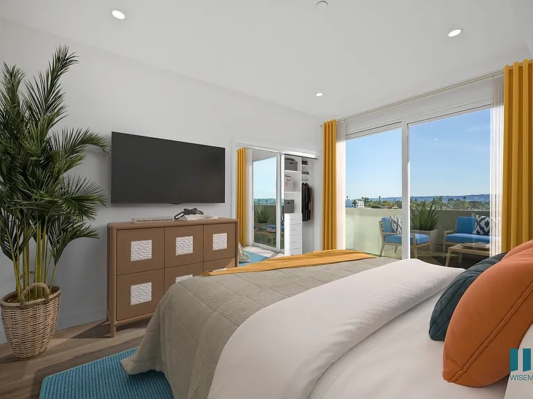 Bedroom with a Mirrored LCoset, Vinyl Flooring, and Patio Access - Aspen Floor Plan