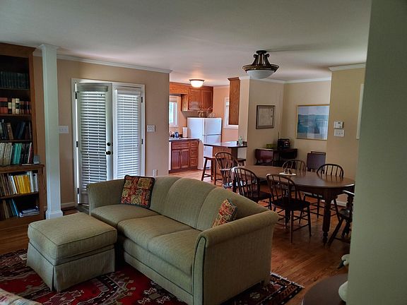 Open floor plan of kitchen, dining, living room.