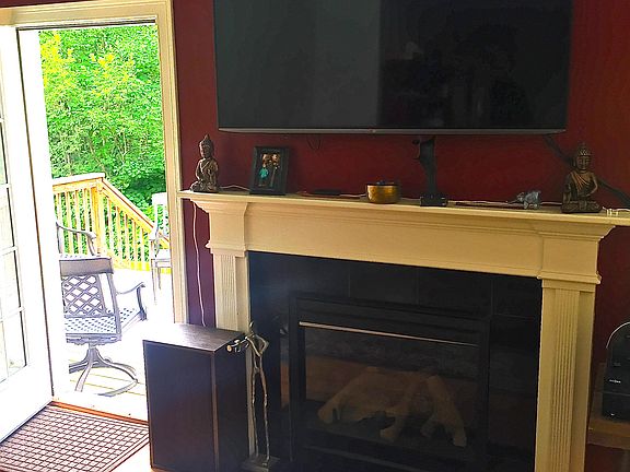 Gas Fireplace open to Deck