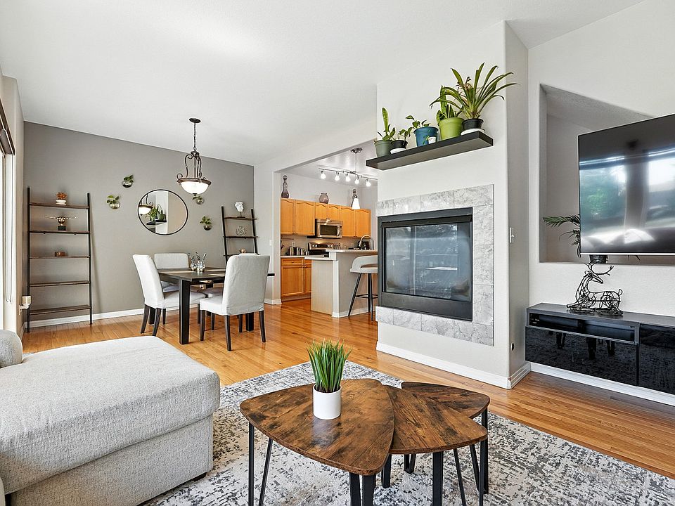 Bright and inviting living room with ample natural light, perfect for relaxation.