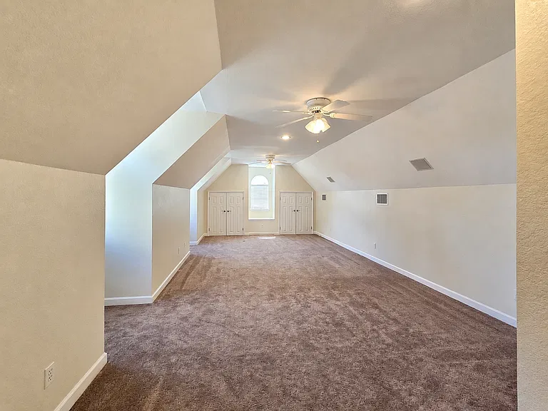 Expansive Upstairs Bonus Room with Dual Storage Closets