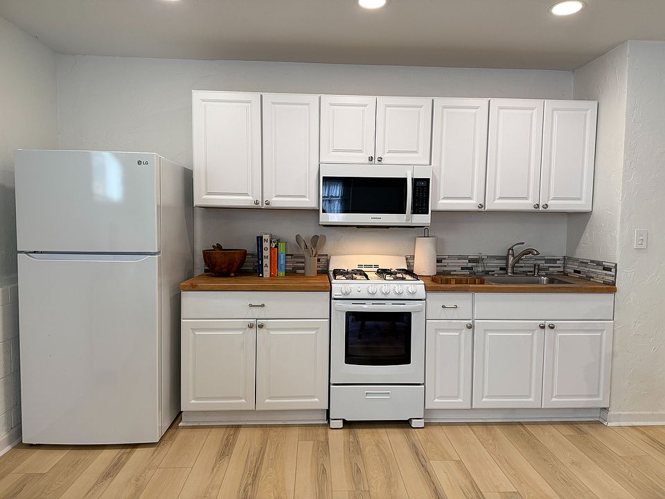 Kitchen is equipped with a full size refrigerator, stove/oven and microwave. Dishes, pots, glasses, mugs and utensils are included as well.