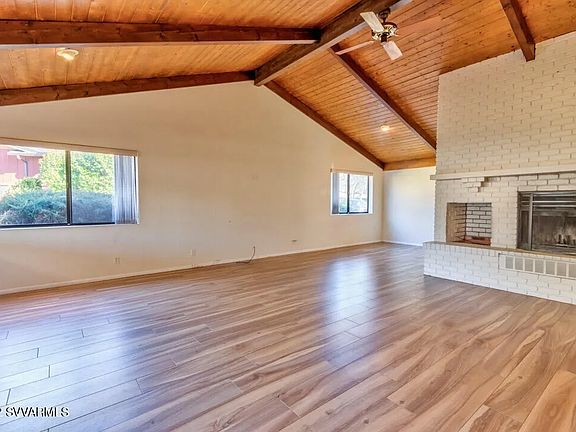 Vaulted ceiling with wood fireplace