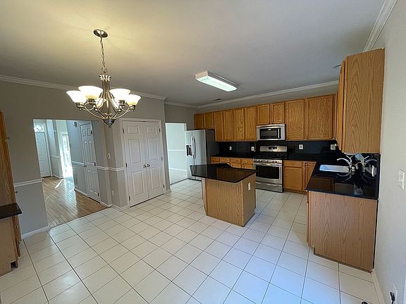 5th image of 9642 Eaton Woods Pl
