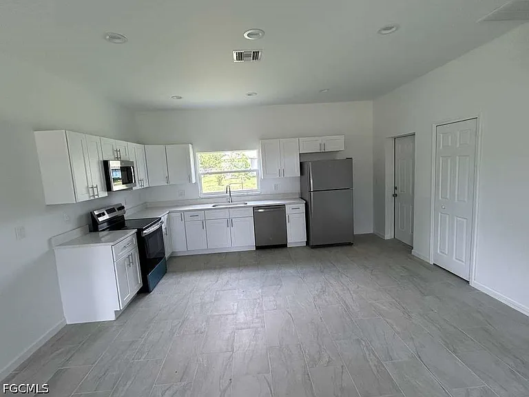 1701 NE 44th Terrace Cpe — Photo 20