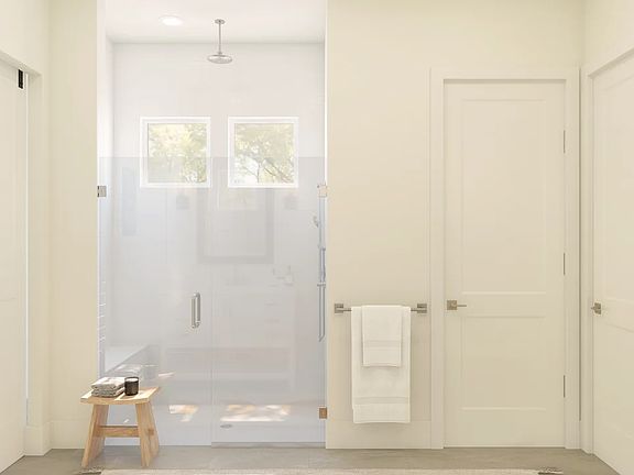 Primary bath with glass-shower enclosure