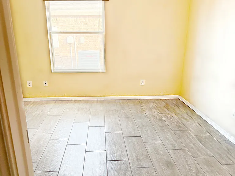 Bedroom #4 with also the new ceramic wood tile flooring.