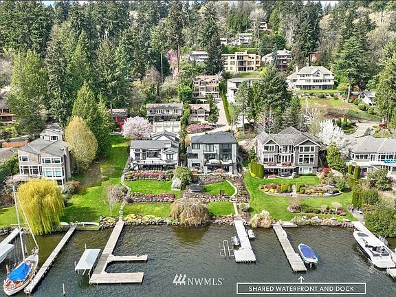 30 feet of shared waterfront and dock are exceptional extra amenities! 